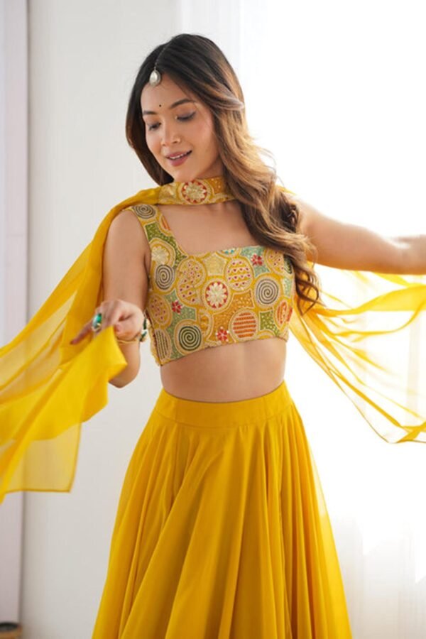 NKB-50YELLOW_4.jpg Yellow Color Fully Flared Lehenga Choli with Intricate Embroidery
